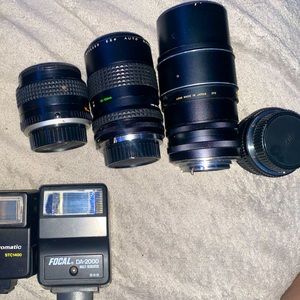 Minolta lenses, great zoom.